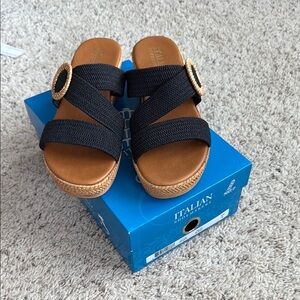 Brand new in box, black wedge mules size 9